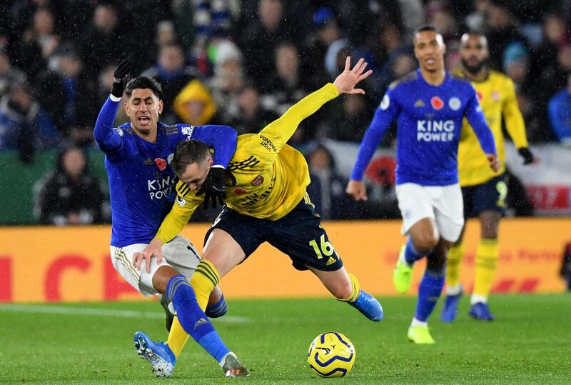 Leicester City forward Ayoze Perez vies for the ball against Arsenal defender Rob Holding. EPA