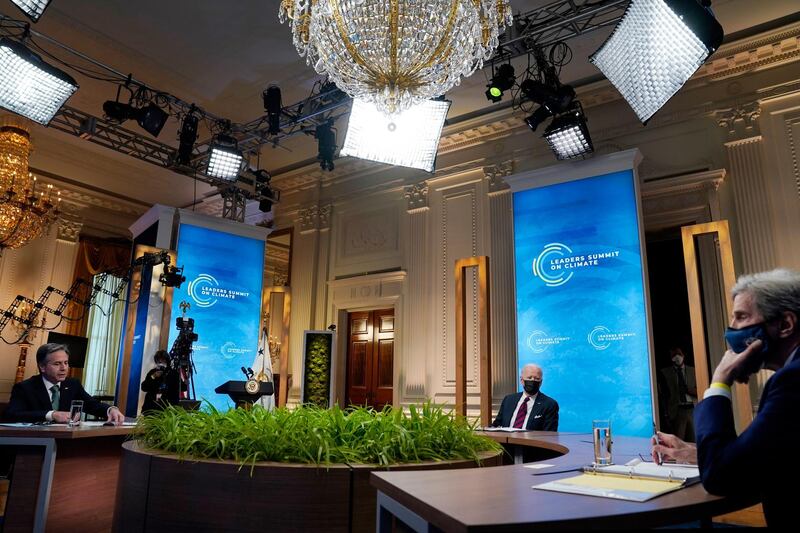 President Joe Biden, Secretary of State Antony Blinken, left, and Special Presidential Envoy for Climate John Kerry, right, listen during the virtual Leaders Summit on Climate. AP Photo