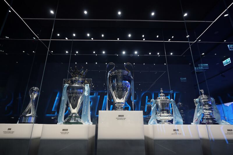 The trophy cabinet displaying the five trophies the club won over the season. 
