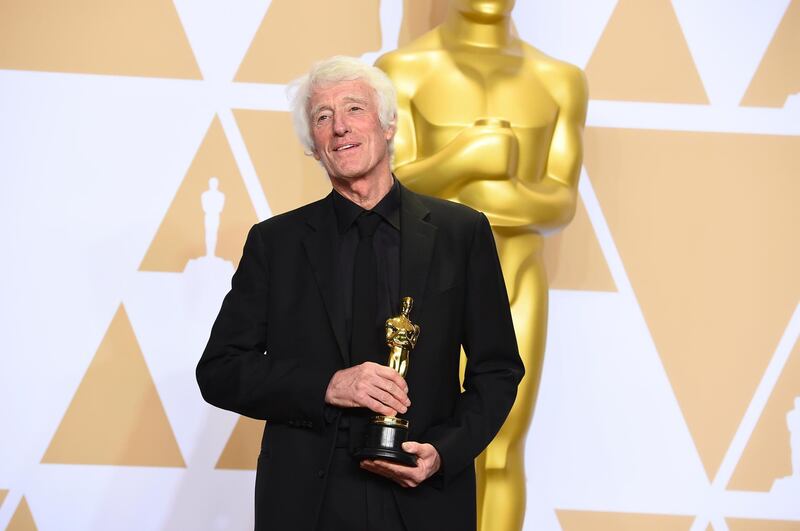 Roger Deakins, winner of the award for best cinematography for "Blade Runner 2049", poses in the press room at the Oscars on Sunday, March 4, 2018, at the Dolby Theatre in Los Angeles. (Photo by Jordan Strauss/Invision/AP)