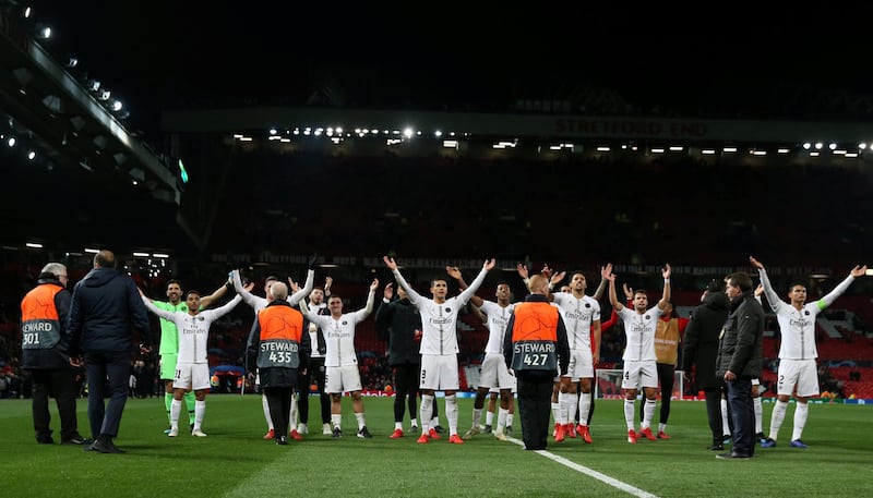 Paris Saint-Germain players celebrate in front of their fans at the end of the match. Reuters
