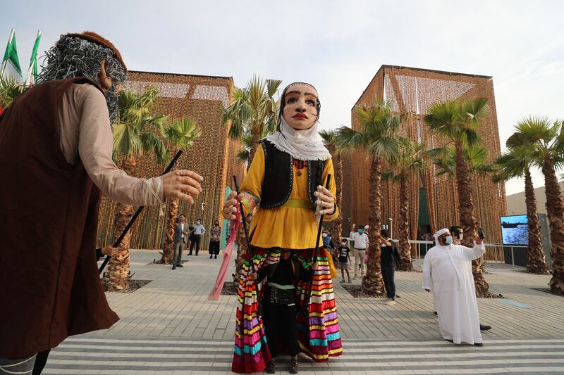 Performers outside the Iranian pavilion