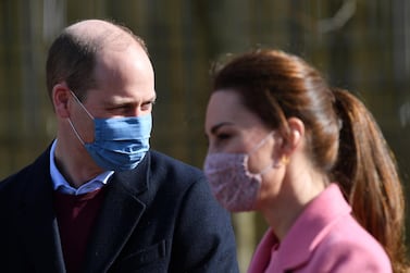 Prince William and Catherine, Duchess of Cambridge, during a visit to a school in east London on Thursday. Getty Images
