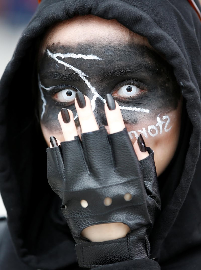 A guest in costume attends the Middle East Film and Comic Con. EPA