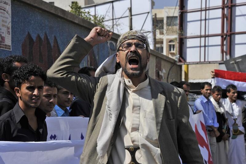 Yemeni activists shout slogans during a rally against the control by Shiite Houthi fighters of the country’s main cities, in Sanaa, Yemen November 1. EPA