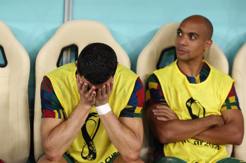 Cristiano Ronaldo did not look happy about starting the game on the bench. Getty