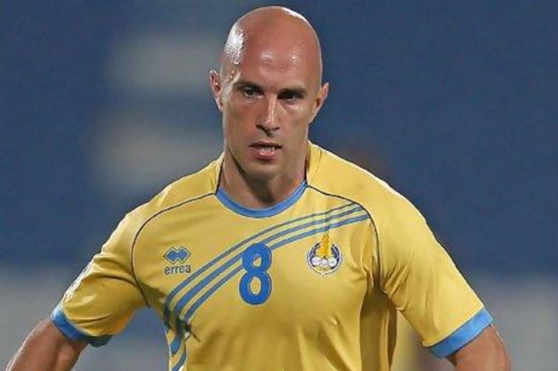 Mark Bresciano, a former Al Nasr player, could have been at the receiving end of jeers from the local fans had he played tonight. Karim Jaafar / AFP