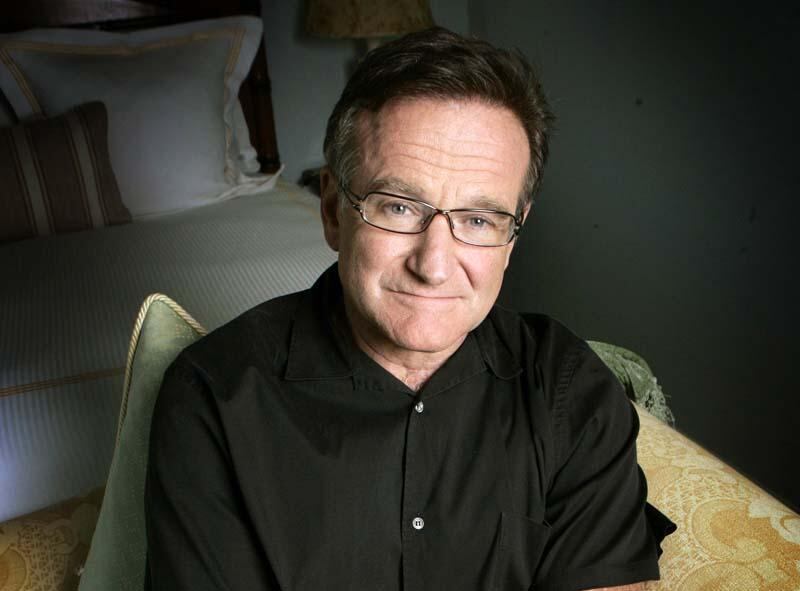 FILE - In this June 15, 2007 file photo, actor and comedian Robin Williams poses for a photo in Santa Monica, Calif. Williams died Monday, Aug. 11, 2014, in an apparent suicide at his San Francisco Bay Area home. (AP Photo/Reed Saxon, File)