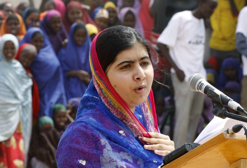 Malala Yousafza speaks to refugees in the Dadaab refugee camp, Kenya on July 12, 2016, her 19th birthday. Khalil Senosi / AP 