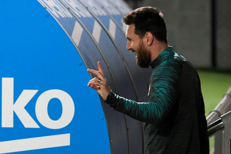 Lionel Messi arrives for a training session at Joan Gamper Sports City. AFP