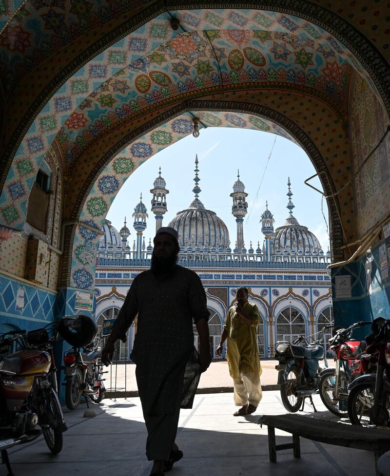 Pakistani Muslims leave the mosque in Rawalpindi ahead of the start of Ramadan. Muslims are preparing for Ramadan, which is calculated on the sighting of the new moon, and during which they fast from dawn until dusk.  AFP