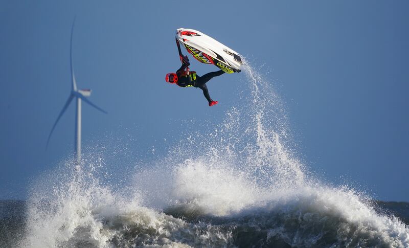 A jet skier pictured jumping the waves off the coast at Blyth in Northumberland on Thursday. PA