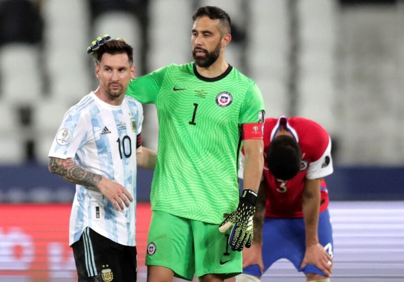 Claudio Bravo from Chile greets Lionel Messi from Argentina. EPA