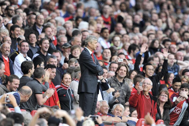MANCHESTER, ENGLAND - AUGUST 29:  Arsenal Manager Arsene Wenger looks on after being sent to the stands during the Barclays Premier League match between Manchester United and Arsenal at Old Trafford on August 29, 2009 in Manchester, England.  (Photo by Laurence Griffiths/Getty Images)