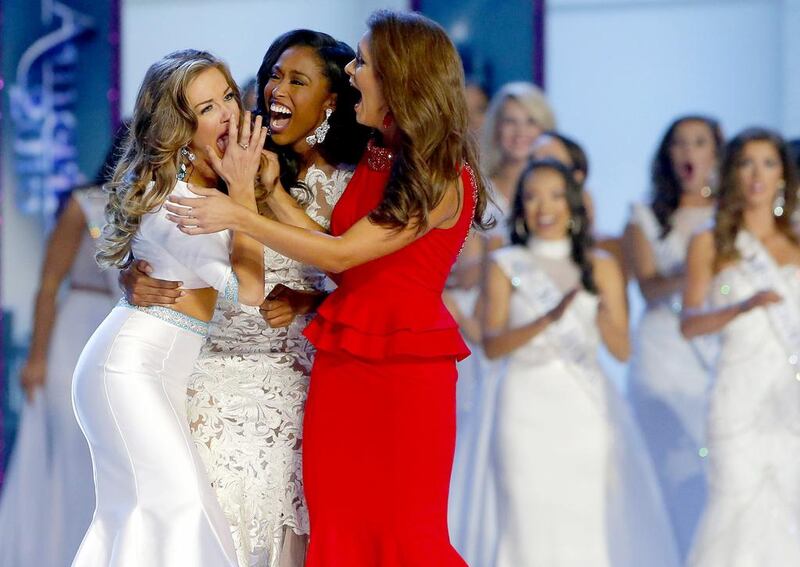 Miss Georgia Betty Cantrell, left, reacts with Miss South Carolina Daja Dial, center, and Miss Oklahoma Georgia Frazier after being named Miss America 2016. AP