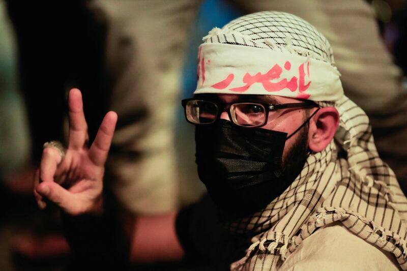 A peace gesture from a follower of Moqtada Al Sadr. Reuters