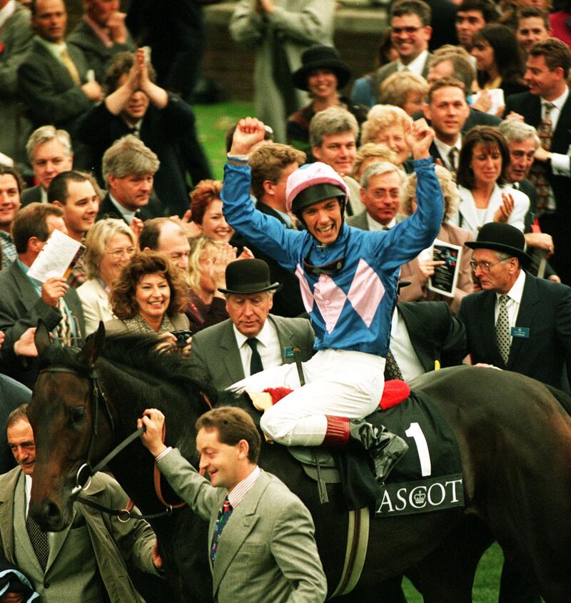 Frankie Dettori celebrates on Fujiyama Crest after winning The Gordon Carter Stakes. He won all seven races on the 1996 Royal Ascot race car. PA