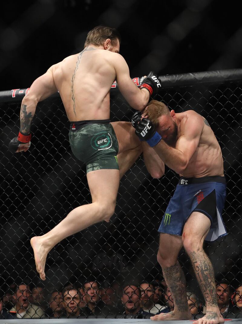 Conor McGregor lands a knee to the face of Donald Cerrone in their welterweight fight during UFC246 at the T-Mobile Arena, on Saturday, January 18. The Irish fighter won the bout after just 40 seconds of the first round  in Las Vegas. AFP