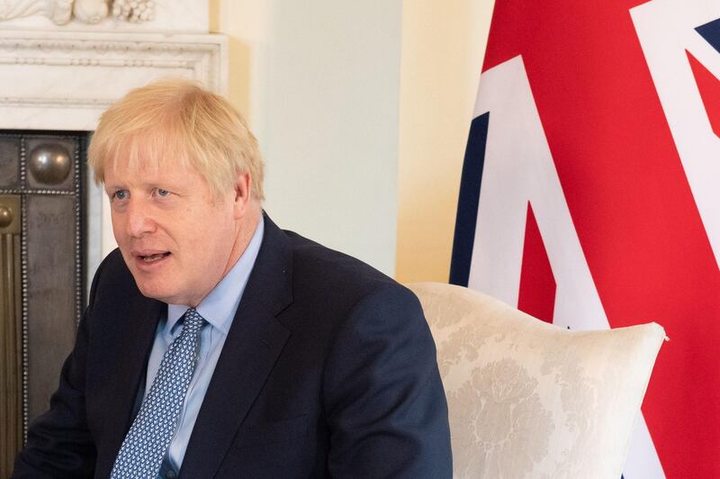 Britain's Prime Minister Boris Johnson gestures as he meets with Estonian Prime Minister Juri Ratas at 10 Downing Street in central London on August 6, 2019. / AFP / POOL / Dominic Lipinski
