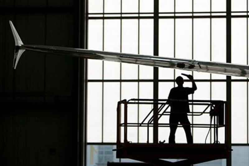 A technician works on the final assembly line at Airbus SAS's A320 plant in Tianjin, China, on Tuesday, Sept. 14, 2010. Airbus SAS is in talks with Chinese authorities and companies for an order for 150 planes worth $16 billion at catalogue prices, French daily La Tribune reported, citing unidentified people. Photographer: Nelson Ching/Bloomberg *** Local Caption ***  731230.jpg