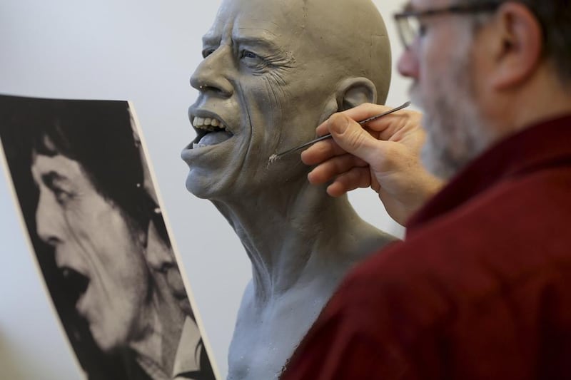Fifteen artists, including sculptors, moulders, dressmakers, make-up artists, wig makers, hairdressers along with lighting and set designers and sound engineers are involved in the creation of the hyper realistic statues. Philippe Wojazer / Reuters 