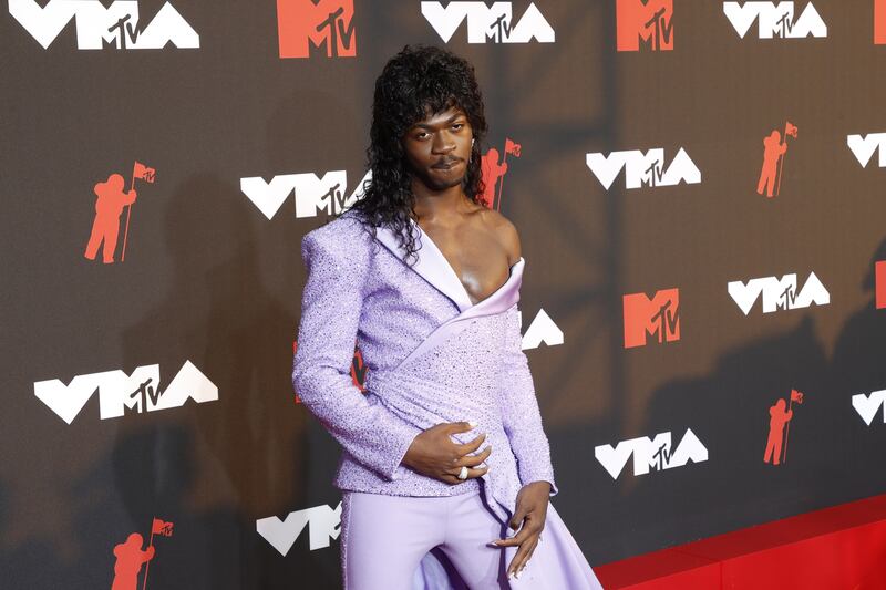 US rapper Lil Nas X, in custom Atelier Versace, arrives on the MTV Video Music Awards red carpet.