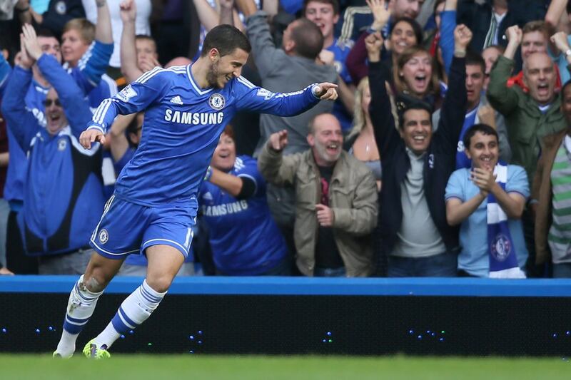 Left midfielder Eden Hazard made one goal and scored two himself as Chelsea came from behind to beat Norwich. Alastair Grant / AP