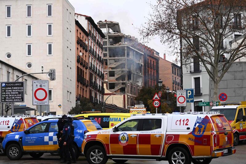 Emergency vehicles in Madrid after a strong explosion rocked the building. AFP