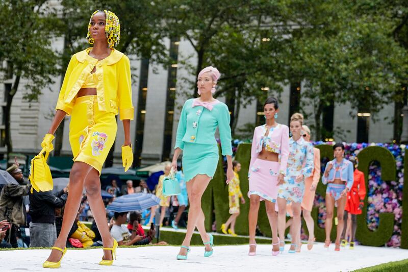 The Moschino collection was filled with bright baby blues, pastel pinks and greens and purples, and brilliant yellows at New York Fashion Week.  AP