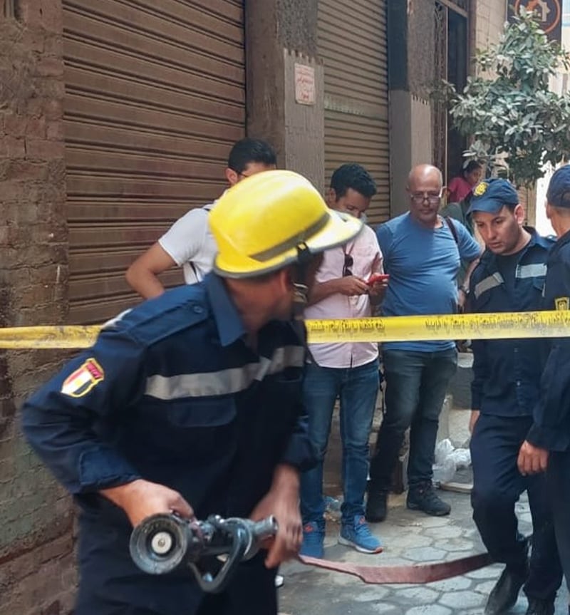 Firefighters at the church in the aftermath of the deadly blaze. Photo: Ministry of the Interior