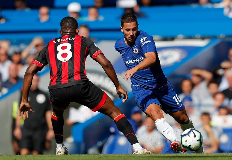 Chelsea's Eden Hazard, right, and Bournemouth's Jefferson Lerma challenge for the ball during the English Premier League soccer match between Chelsea and Bournemouth at Stamford Bridge stadium in London, Saturday, Sept. 1, 2018.(AP Photo/Frank Augstein)