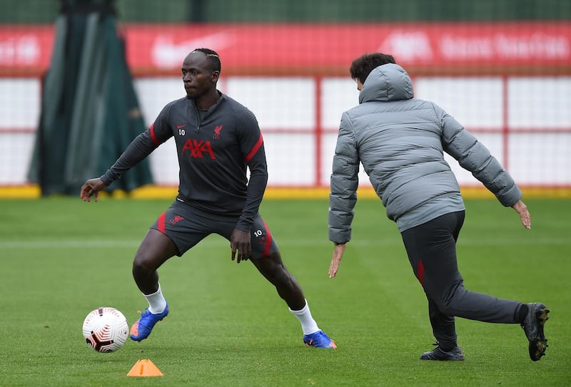 LIVERPOOL, ENGLAND - OCTOBER 13: (THE SUN OUT. THE SUN ON SUNDAY OUT) Sadio Mane of Liverpool with Vitor Matos of Liverpool during a training session at Melwood Training Ground on October 13, 2020 in Liverpool, England. (Photo by John Powell/Liverpool FC via Getty Images)
