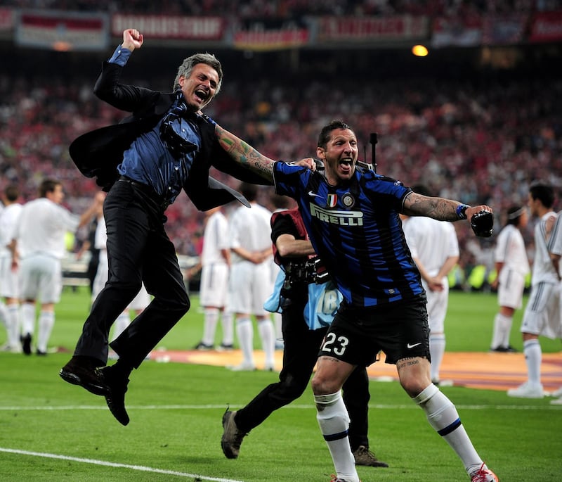 MADRID, SPAIN - MAY 22:  Head coach Jose Mourinho (L) and Marco Materazzi of Inter Milan celebrate their team's victory at the end of the UEFA Champions League Final match between FC Bayern Muenchen and Inter Milan at the Estadio Santiago Bernabeu on May 22, 2010 in Madrid, Spain.  (Photo by Shaun Botterill/Getty Images)