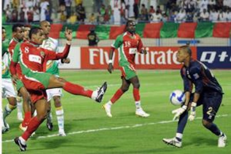 REFILE - CORRECTING NAME OF TOURNAMENT



Paulo Sergio (L) of Saudi's Ettifaq kicks the ball as Ahmed Ashoori, goalkeeper of UAE's Al Shabab Al Arabi, catches during their AFC Champions League soccer match in Khobar April 8, 2009.   REUTERS/Stringer (SAUDI ARABIA SPORT SOCCER) *** Local Caption ***  AMM103a_SOCCER-_0409_11.JPG