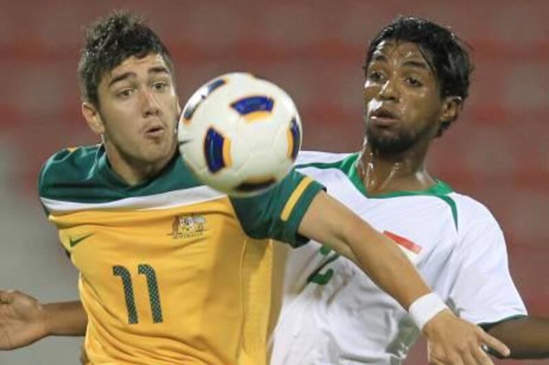 Jasim Faisal, right, picked up his second yellow card of the campaign against Australia, but played the following week against the UAE.