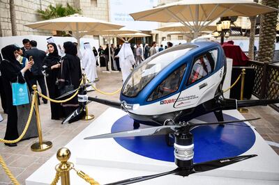 A model of the EHang 184 autonomous aerial vehicle is displayed at the World Government Summit 2017 in Dubai's Madinat Jumeirah on February 13, 2017. / AFP PHOTO / STRINGER