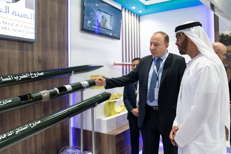 ABU DHABI, UNITED ARAB EMIRATES - February 21, 2019: HH Sheikh Mohamed bin Zayed Al Nahyan, Crown Prince of Abu Dhabi and Deputy Supreme Commander of the UAE Armed Forces (R), visits the Arab Organization for Industrialization stand, during the 2019 International Defence Exhibition and Conference (IDEX), at Abu Dhabi National Exhibition Centre (ADNEC). 

( Ryan Carter for the Ministry of Presidential Affairs )
---