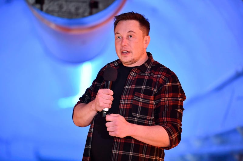 (FILES) In this file photo taken on December 18, 2018 Elon Musk, co-founder and chief executive officer of Tesla Inc., speaks during an unveiling event for the Boring Company Hawthorne test tunnel in Hawthorne, south of Los Angeles, California.  The US Securities and Exchange Commission accused Tesla founder Elon Musk on February 25, 2019, of failing to comply with a court-endorsed deal between the electric automaker and the regulatory agency. According to the SEC, a tweet from Musk on Tesla's 2019 production levels violates the deal, under which his tweets had to be reviewed prior to being published.
 / AFP / Robyn Beck
