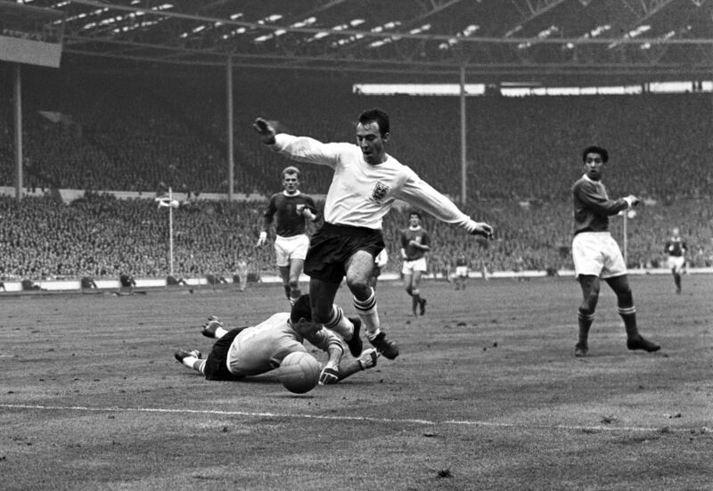 4)  Jimmy Greaves - 44 goals in 57 games. AP