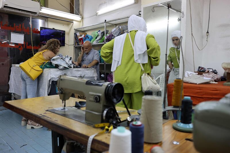 Tailor Mohammed Muazzin, who has been a tailor for four decades, said: 'People used to buy trousers, wear them a few times and then get rid of them. Today, they give them to their brother or another relative'