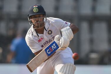 India's Mayank Agarwal plays a shot during the third day of the second Test cricket match between India and New Zealand at the Wankhede Stadium in Mumbai on December 5, 2021.  (Photo by Punit PARANJPE  /  AFP)  /  ----IMAGE RESTRICTED TO EDITORIAL USE - STRICTLY NO COMMERCIAL USE-----