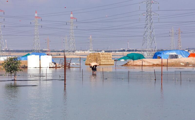 This picture shows tents that were flooded following heavy rains in Al Rawdatayn, about 115 kilometres north of Kuwait City. AFP