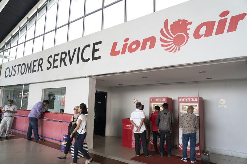 Customers use ticket machines at the Lion Air customer service area at Soekarno-Hatta International Airport in Cengkareng, Jakarta, Indonesia, on Monday, Oct. 29, 2018. A Boeing Co. 737 Max jet, operated by Indonesia's Lion Air, crashed in the Java Sea with 189 people on board, making it the model's first accident and potentially the worst commercial aviation disaster in three years. Photographer: Rony Zakaria/Bloomberg