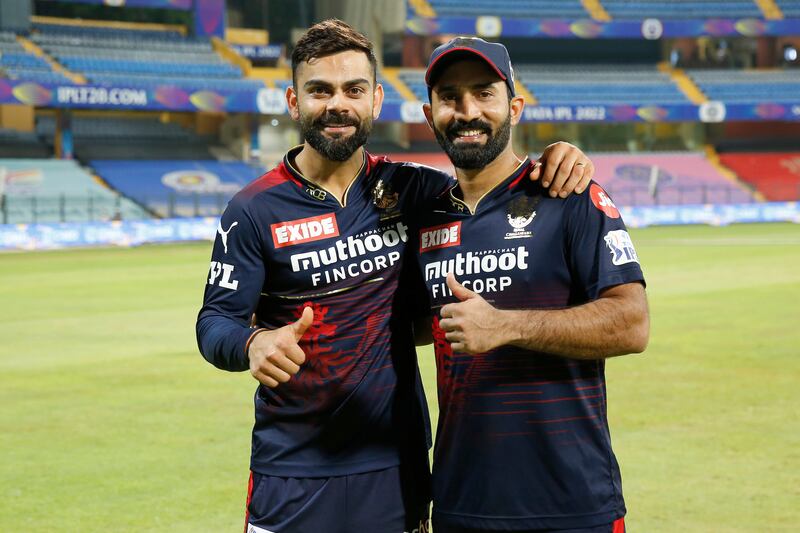 Virat Kohli and Dinesh Karthik of Royal Challengers Bangalore after their win over Delhi Capitals. Sportzpics for IPL
