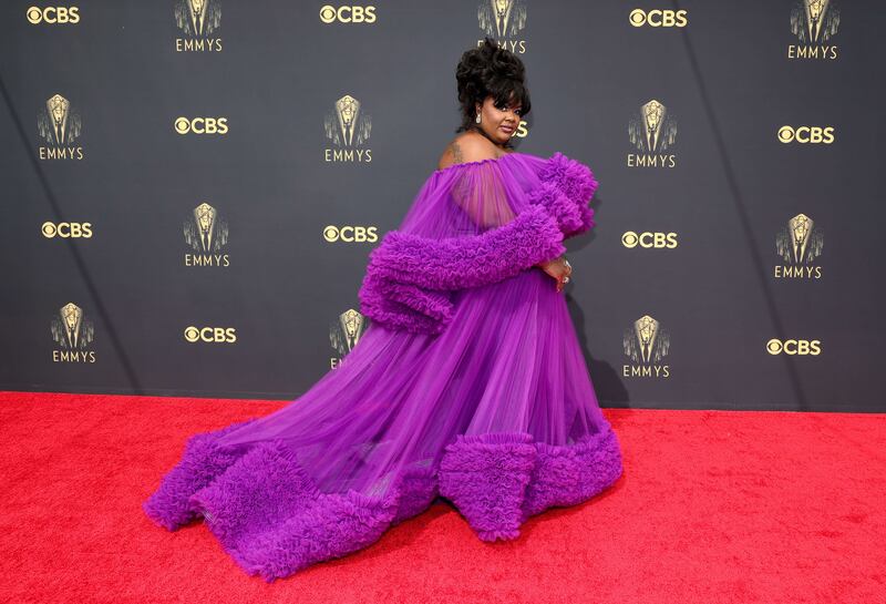 'Nailed it!' star Nicole Byer wore custom Christian Siriano. She thanked all the women who came before her to break the couture barrier for plus-size women, and she went for it in the strapless look with sheer layers that flowed to the ground. AFP