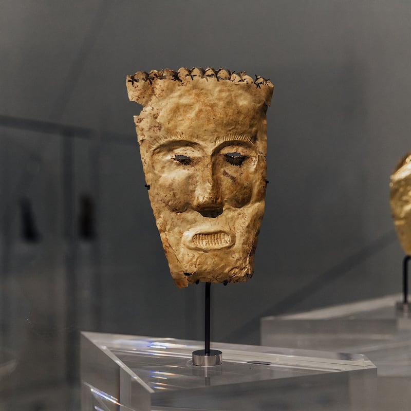 The funerary mask from Butuan City on display in Louvre Abu Dhabi. Photo: Department of Culture and Tourism — Abu Dhabi