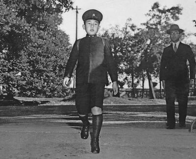 In this Dec. 1945, photo, then Crown Prince Akihito go to a school, in Tokyo. Akihito was 11 years old when he heard his father's voice announcing Japan's World War II surrender on the radio on Aug. 15, 1945. During the subsequent U.S. occupation of Japan, he was tutored in English by Elizabeth Vining, a Quaker, an experience that experts say gave Akihito his pacifist and democratic outlook. Emperor Akihito, who turns 85 on Sunday, Dec. 23, 2018, and will abdicate this spring, says he feels relieved to see the era of his reign coming to an end without having seen his country at war. (Kyodo News via AP)