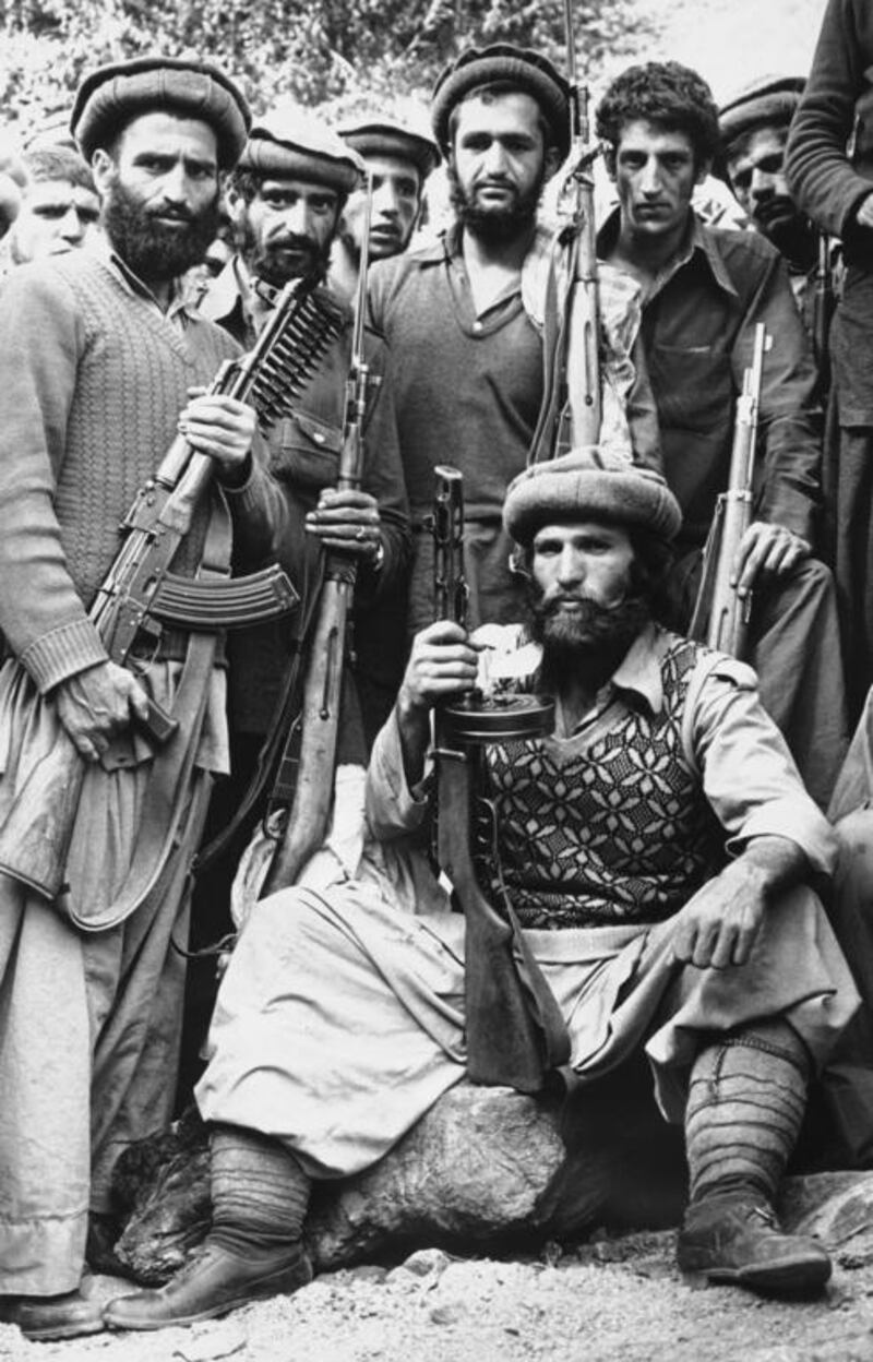 Arab fighters in 1979 take a rest from their fight along the Afghan-Soviet Union border. A key driving force in rebel groups was younger members, as they are today in Syria and Iraq. Steve McCurry / AP Photo