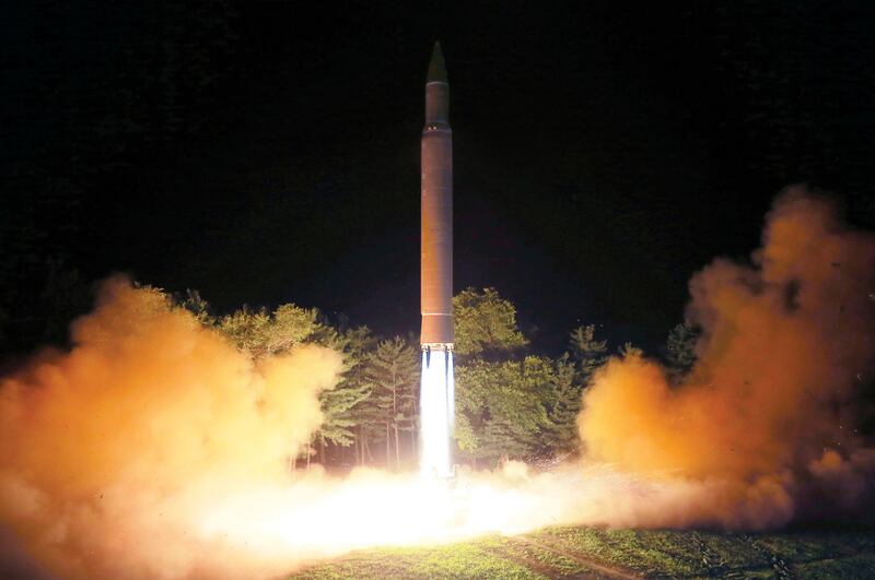 FILE - In this July 28, 2017, file photo distributed by the North Korean government on Saturday, July 29, 2017, shows what was said to be the launch of a Hwasong-14 intercontinental ballistic missile at an undisclosed location in North Korea. A U.S. official says American intelligence agencies have assessed that North Korea has developed a nuclear warhead that could be fitted onto an intercontinental ballistic missile. The official says the Defense Intelligence Agency assessment, first reported by The Washington Post on Aug. 8, says North Korea has made a miniaturized nuclear warhead, but that it would still have to hurdle other technical issues before it could successfully deliver such a weapon. (Korean Central News Agency/Korea News Service via AP, File)