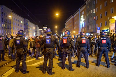Police face off against protesters during a demonstration against Covid measures in Magdeburg. AP 
